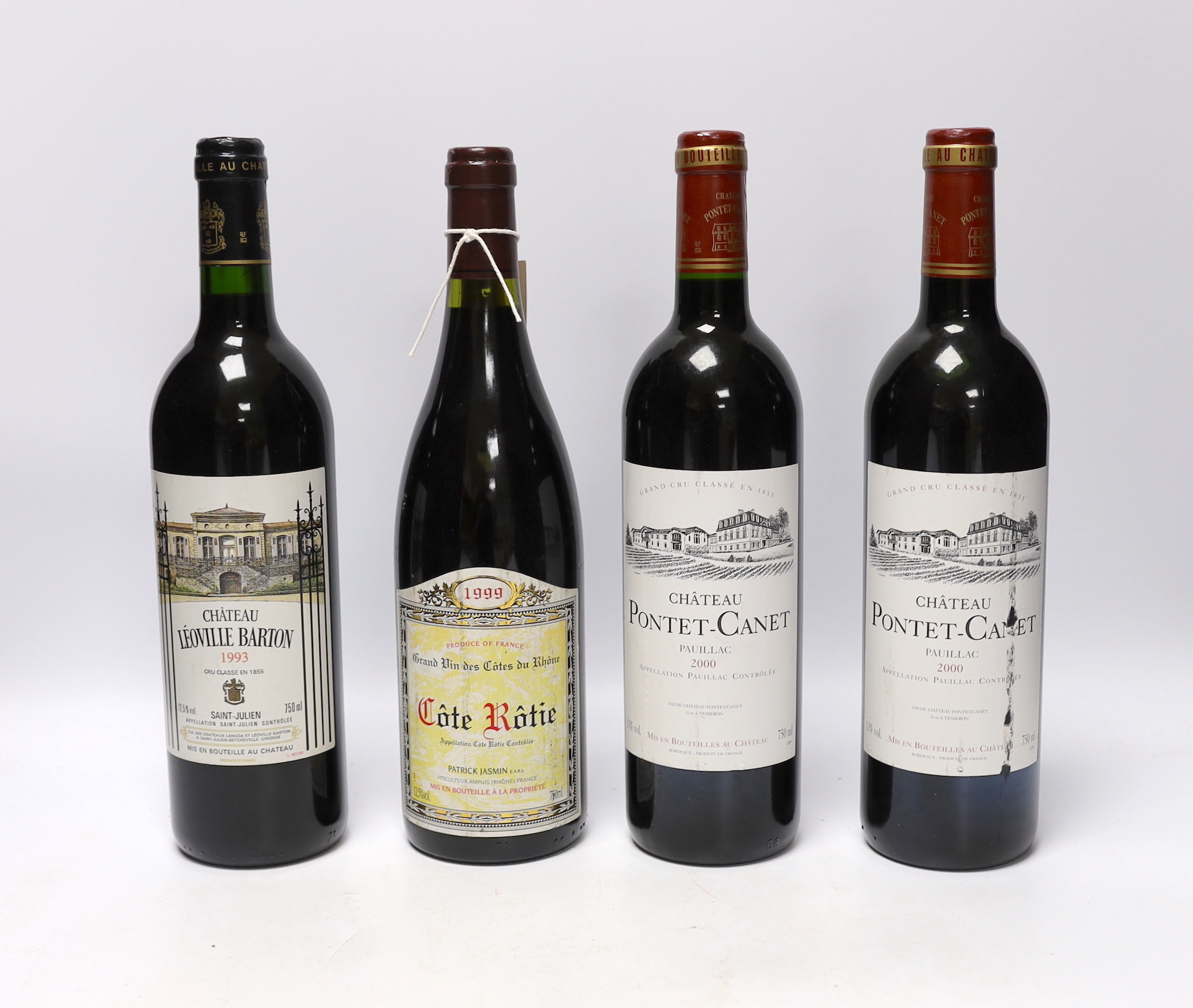 Two bottles of 2000 Chateau Pontet Canet Pauillac, a bottle of 1993 Chateau Léoville Barton Saint Julien and a bottle of 1999 Cote Rotie Patrick Jasmin (4)